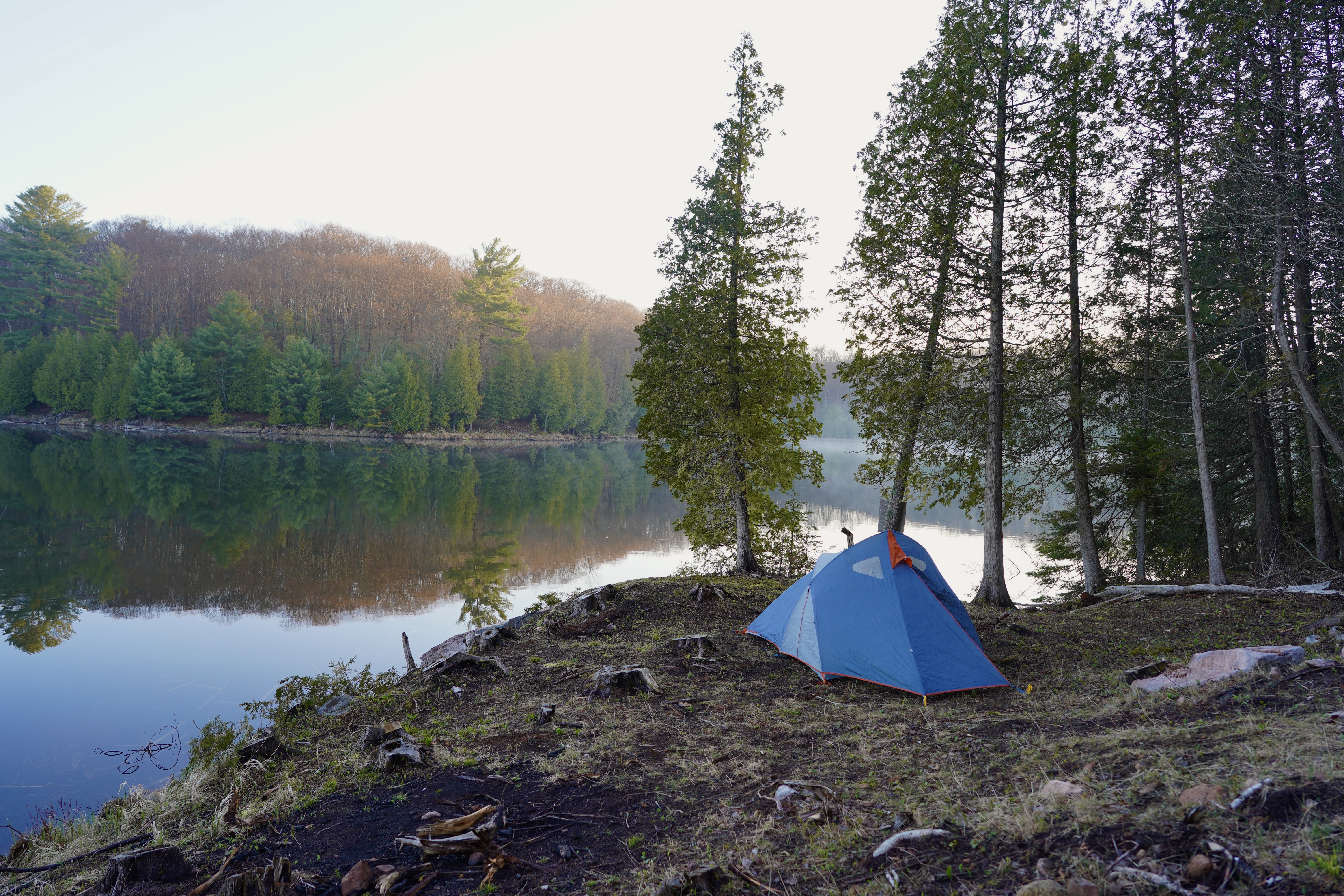 My three-person blue tent on the small point very near the waterline