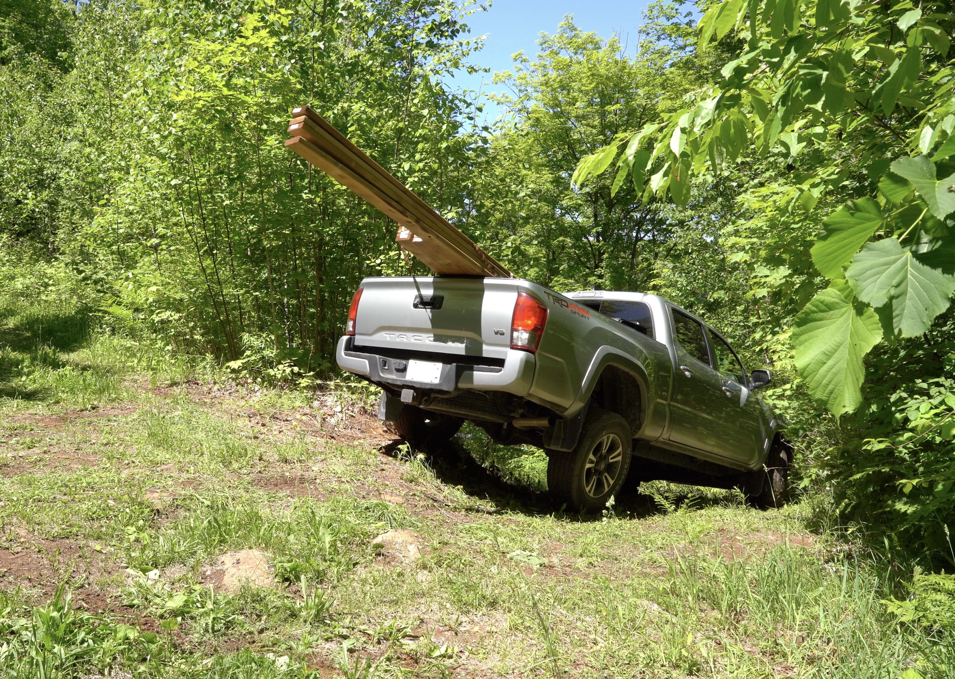 Driving the truck down to the lake, showing the hairpin turn part way down and how it uses all of the suspension the truck has to deal with the terrain