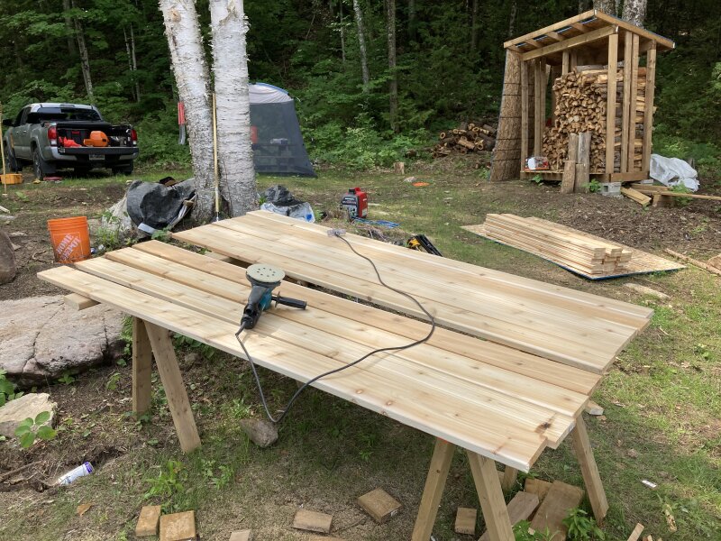Sanding cedar deck boards prior to staining them